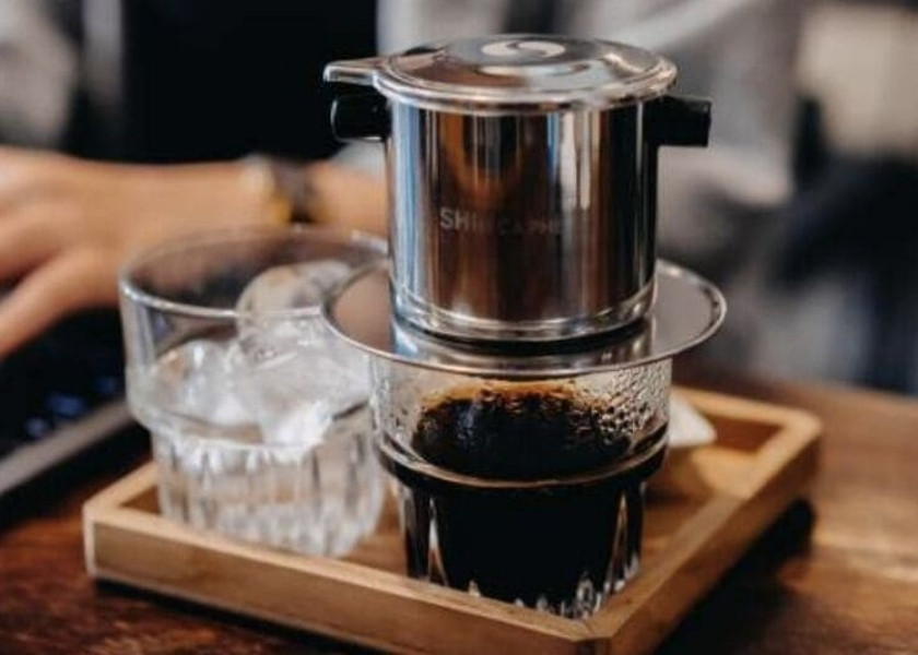 We usually brew coffee with a phin filter, that little metal drip you see sitting on top of the glass