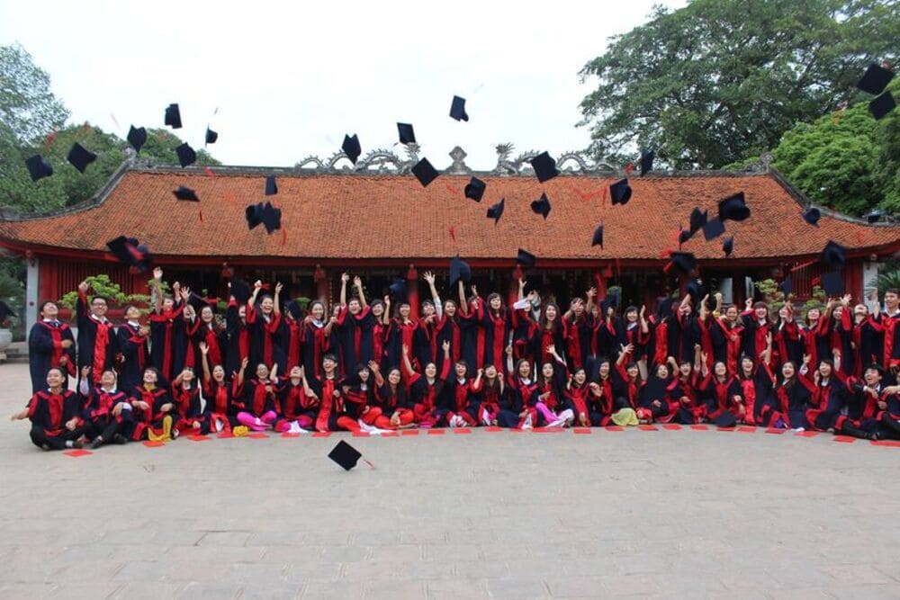 Graduation photos at Temple of Literature Hanoi with students wearing graduation robe